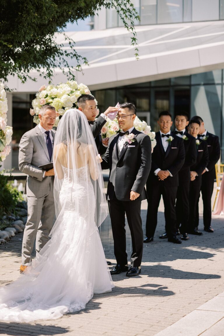 Jonathan Evans officiating a couple's ceremony
