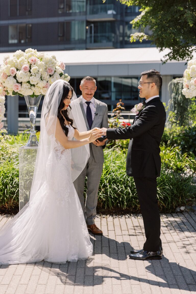 Jonathan Evans officiating a couple's ceremony
