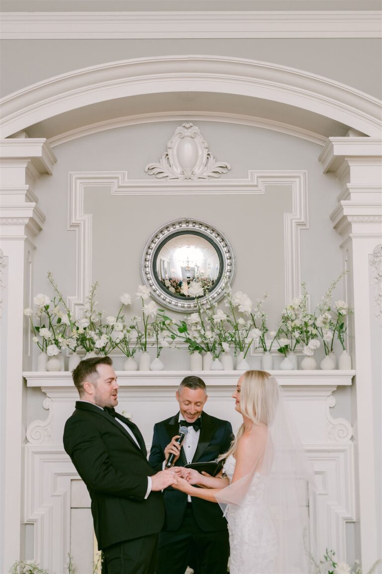 A close moment between the couple during their indoor ceremony