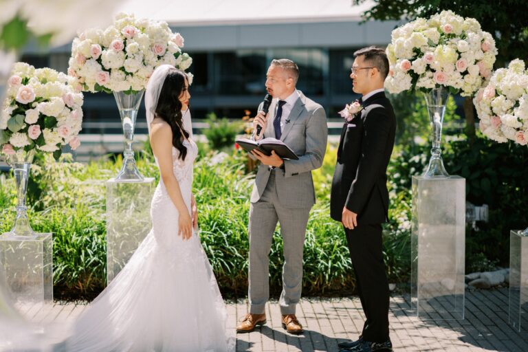 Jonathan Evans officiating a couple's ceremony