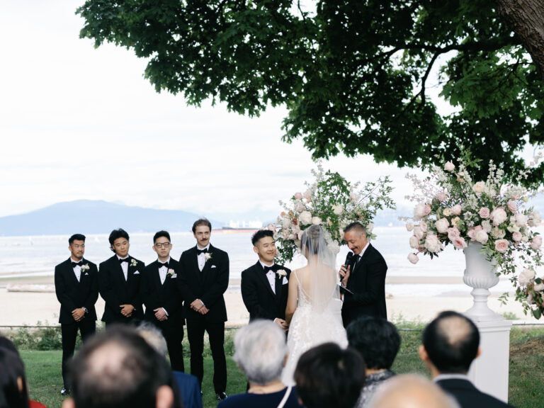 Jonathan Evans officiating Kelsey and Evan's ceremony