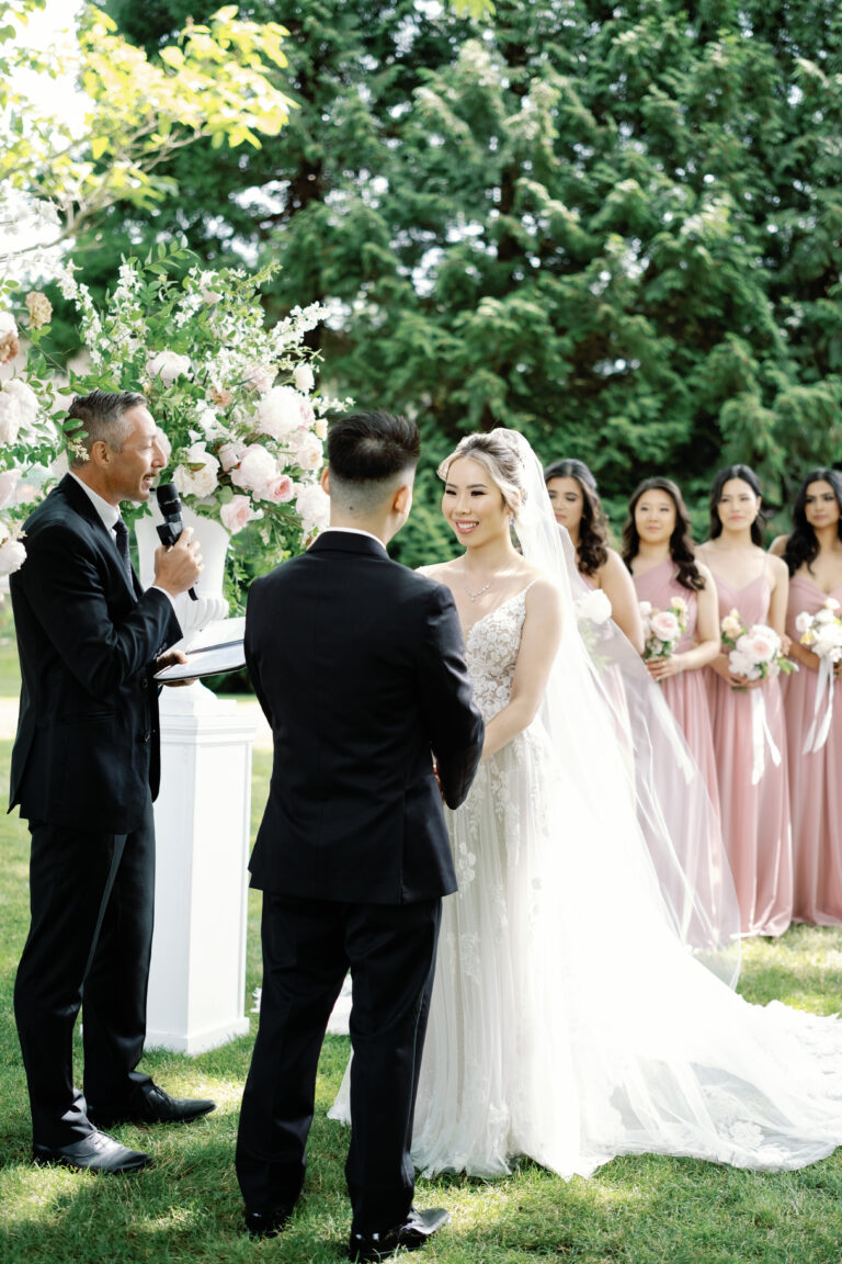 Jonathan Evans officiating Kelsey and Evan's ceremony
