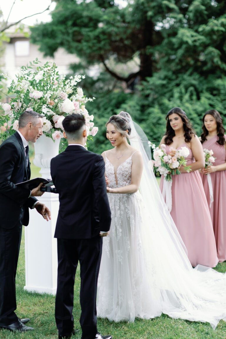 Jonathan Evans officiating Kelsey and Evan's ceremony