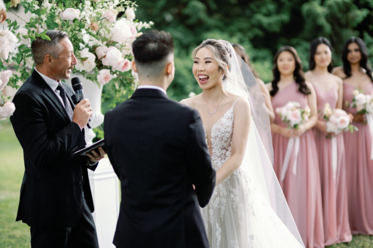 Jonathan Evans officiating Kelsey and Evan's ceremony