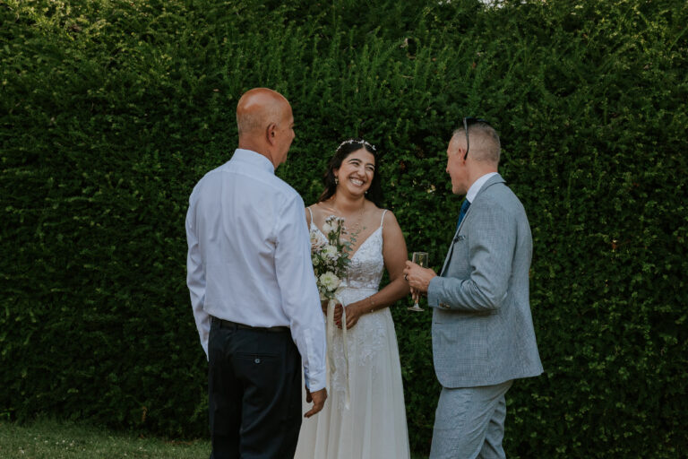 Jonathan Evans officiating Natasha and Albee's ceremony