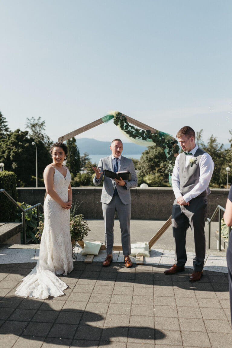 Jonathan Evans officiating a couple's ceremony
