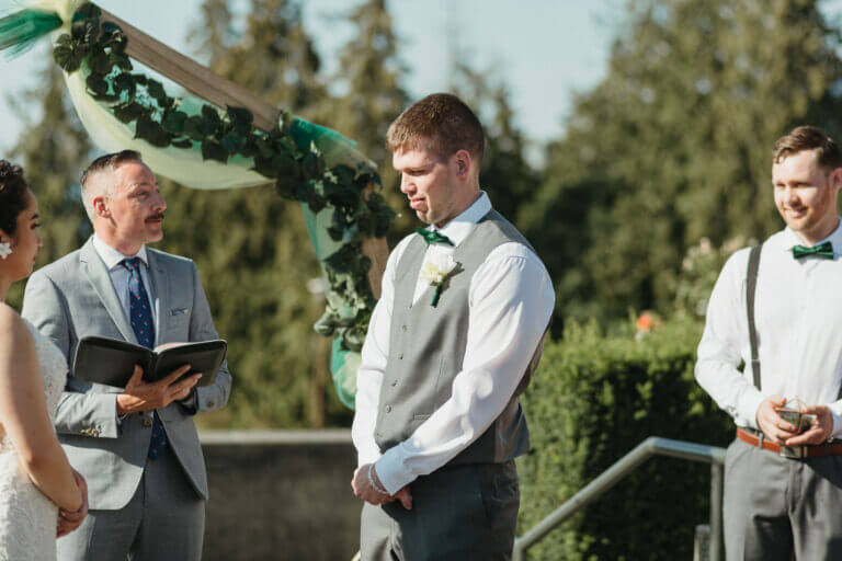 Jonathan Evans officiating a couple's ceremony