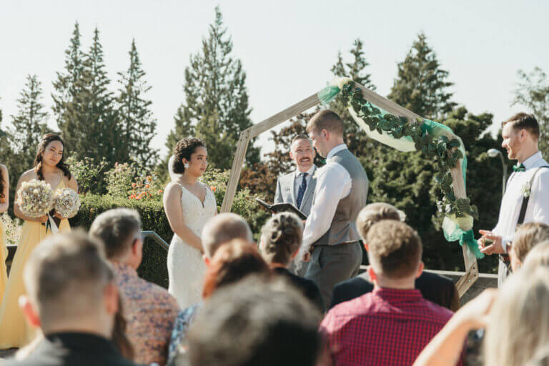 Jonathan Evans officiating a couple's ceremony
