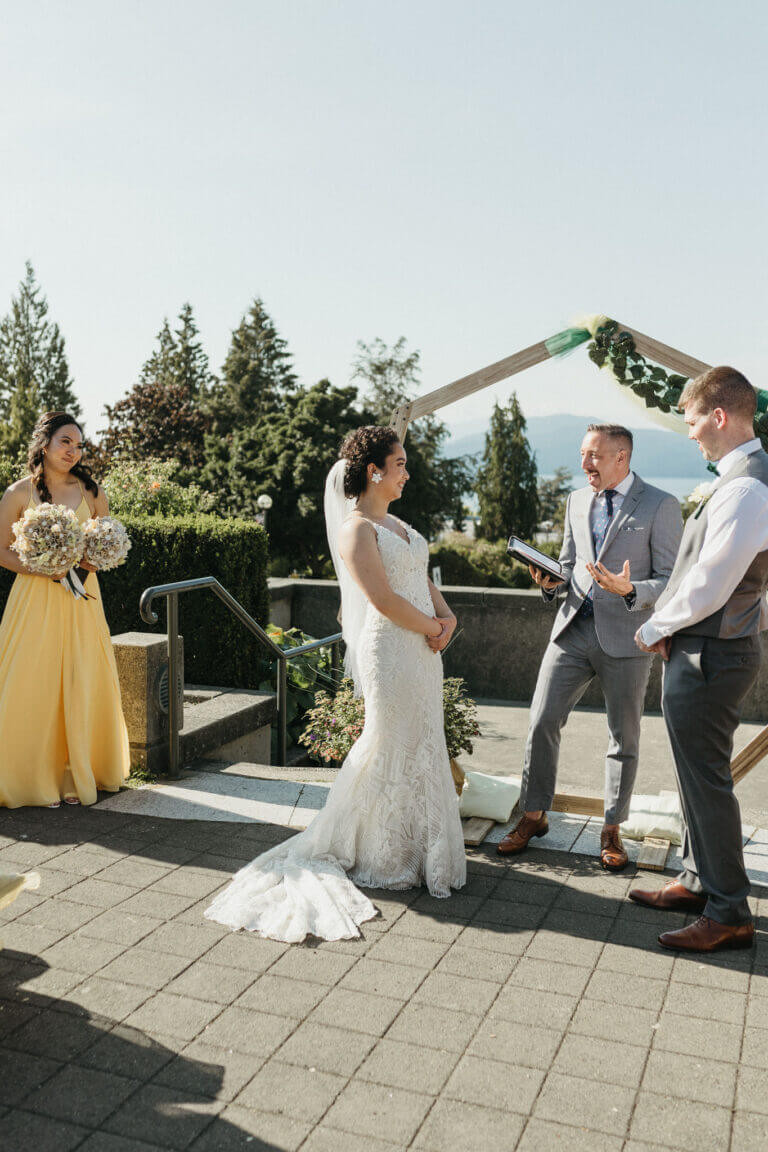 Jonathan Evans officiating a couple's ceremony