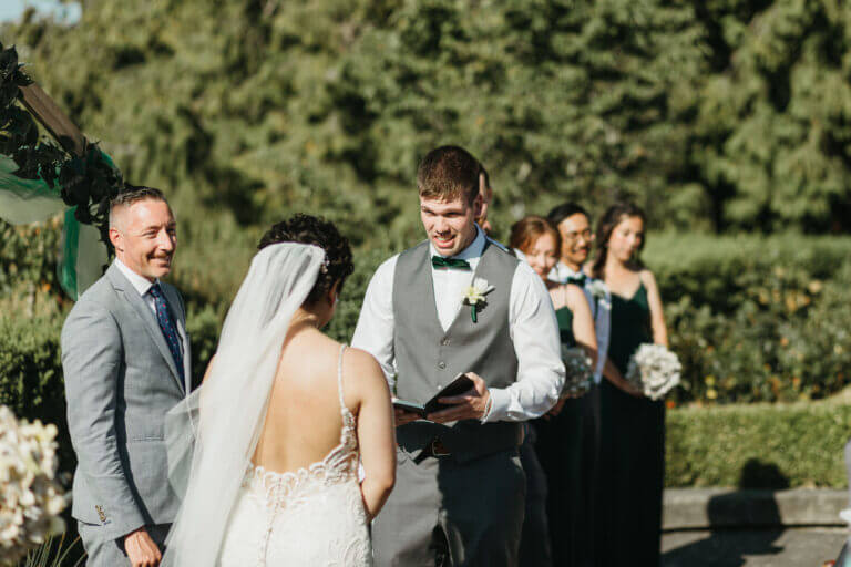 Jonathan Evans officiating a couple's ceremony