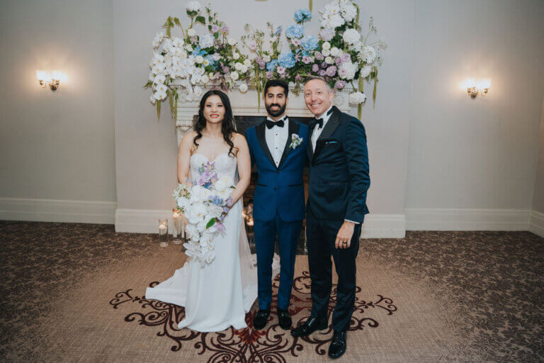 Jonathan Evans with the couple after their outdoor ceremony