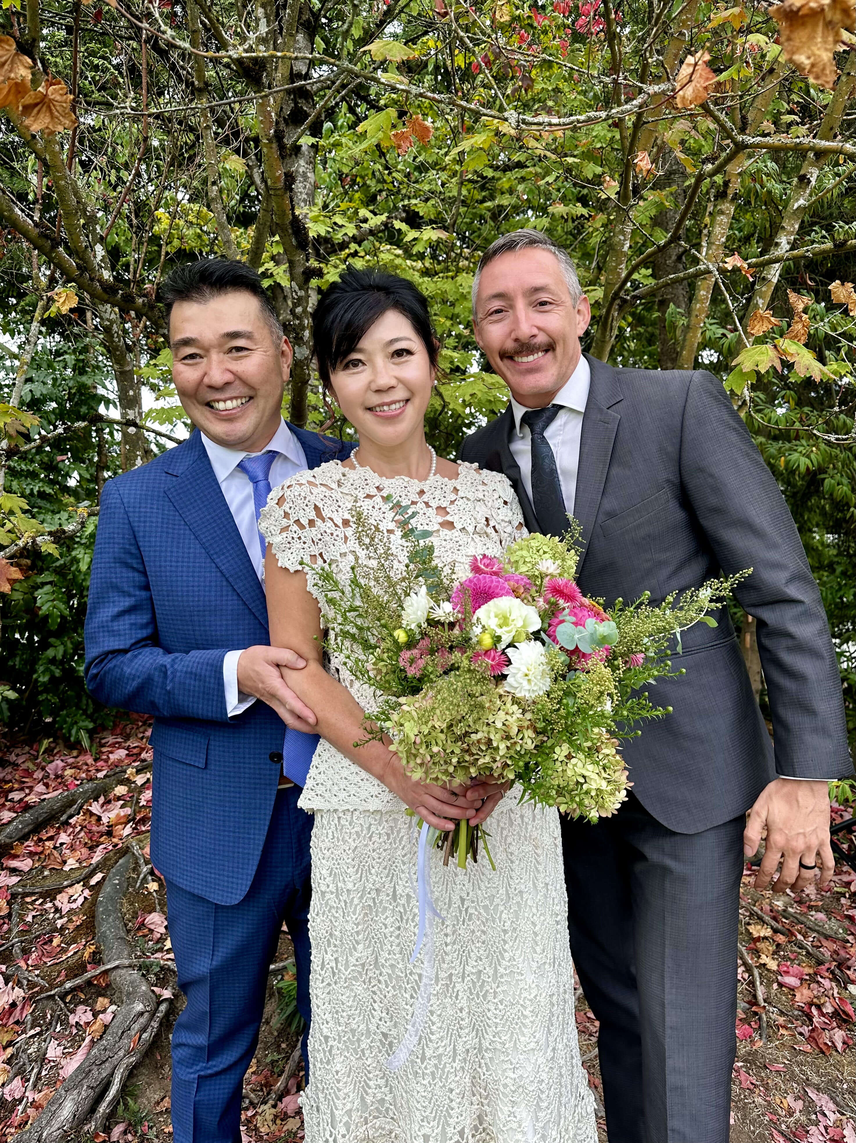 Jonathan Evans with Hiroko and Charles on their wedding day