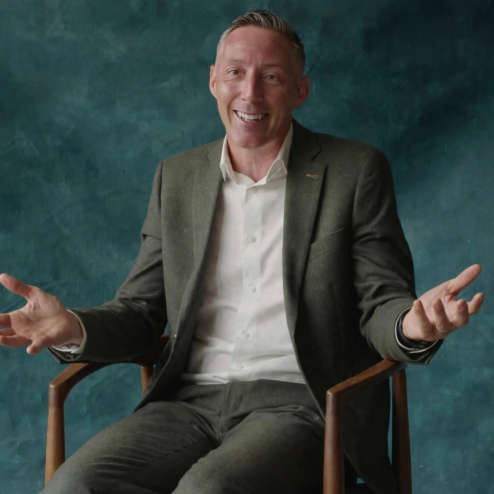 Jonathan Evans, executive coach, smiling directly at the camera
